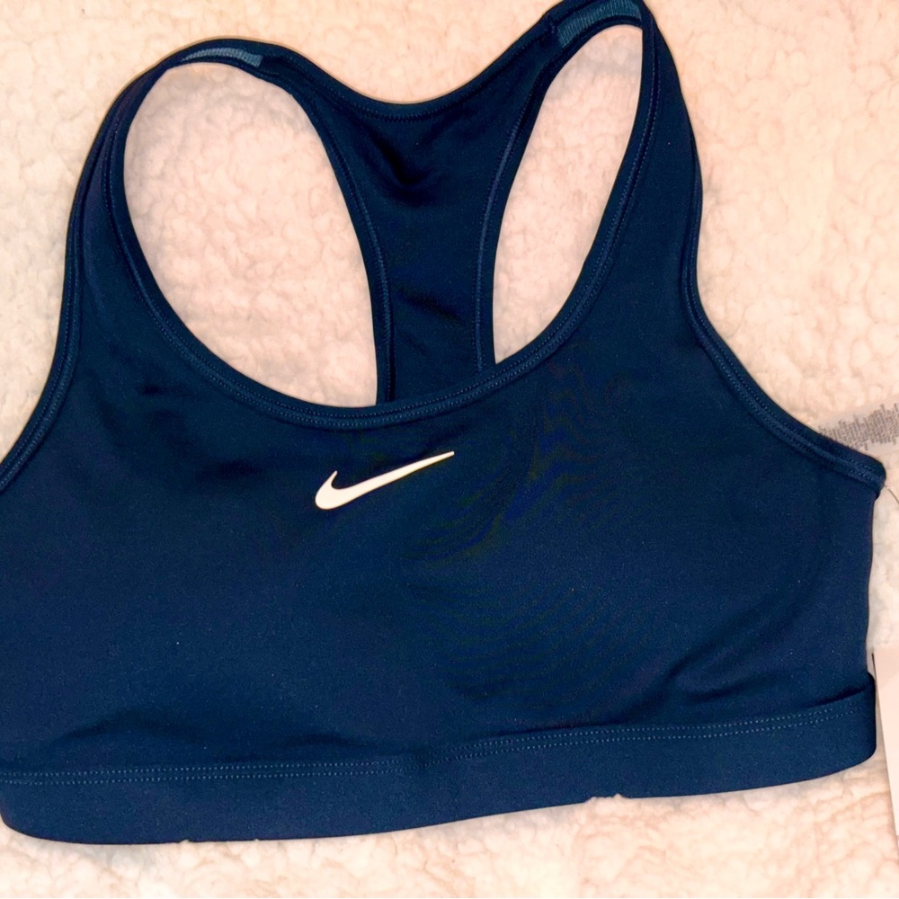 Brand New with Tags  Women’s size Medium Navy Nike Sports Bra